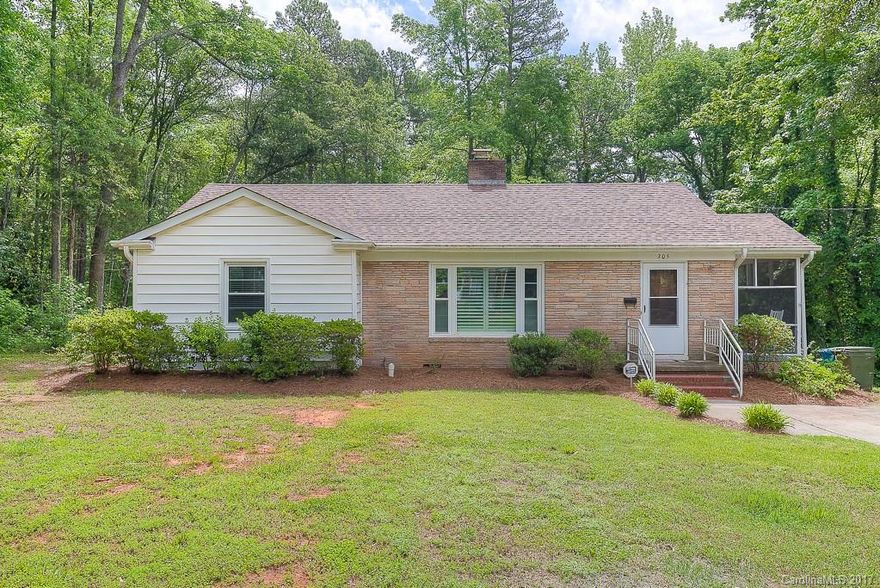 This cozy, charming older home is located in the historical heart of Fort Mill. Hardwood floors and new Plantation shutters in the living room. Nice size yard that backs up to the street facing the Fort Mill golf course. Newer roof, HVAC and gas hot water heater. Nice screened in porch to relax on as the evenings cool down. Refrigerator, washer and dryer to convey. No HOA's.
