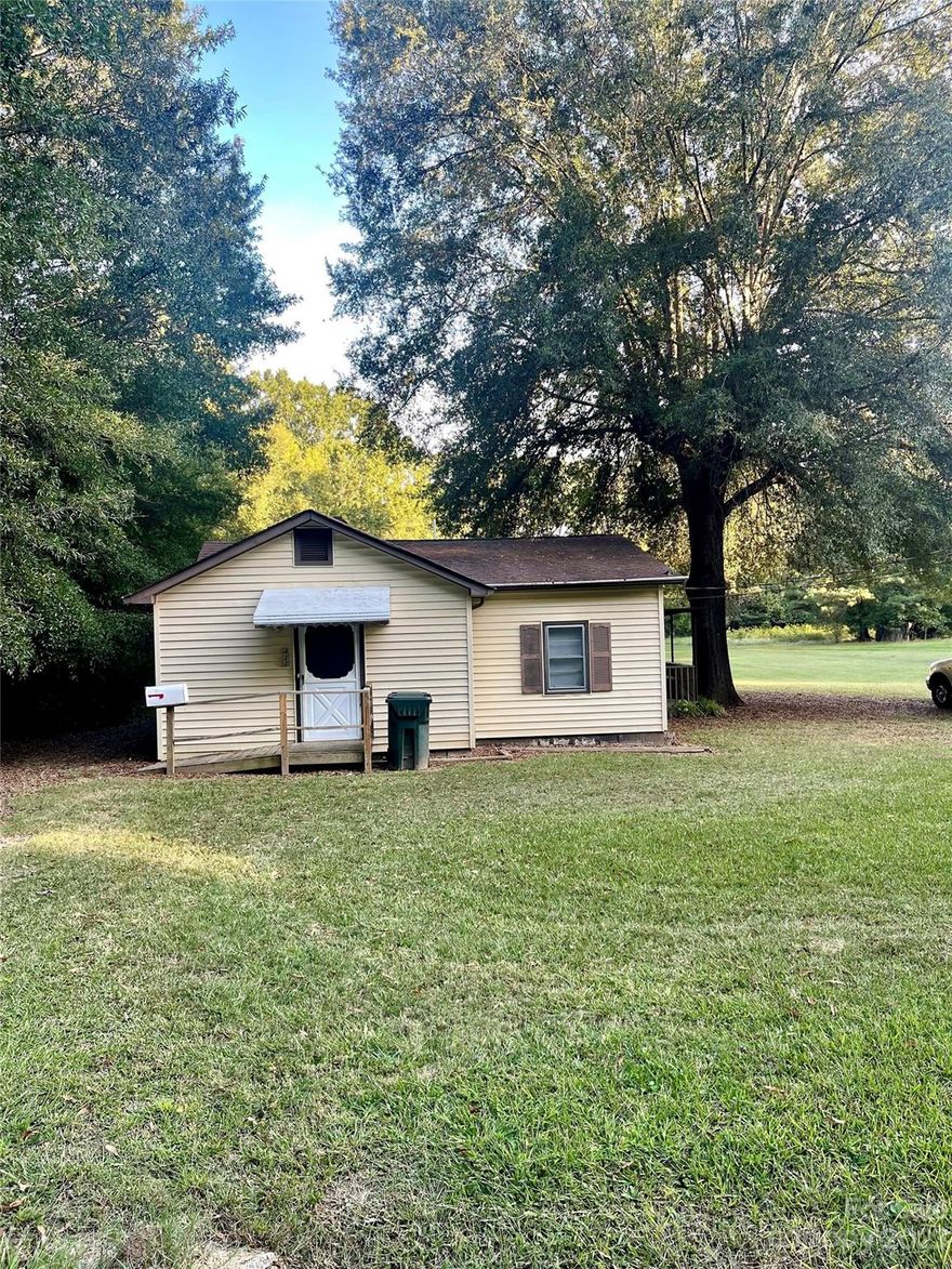 Cozy older home on 1.17 acre level lot. Convenient to Hwy 49, close to downtown.