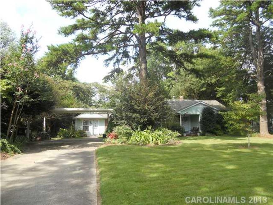 Fantastic home in established neighborhood.  Walk to park & tennis Ct., Custom built-in cabinets in kitchen overlooking lovely fenced backyard.  Yard is a gardener's delight.  Large workshop with electric and water.  All kitchen appliances plus Washer & Dryer, Freezer to convey.  Stove is electric, but plumbed for gas also.  An addition was built in 1992.  Terrific Location, near Winthrop Univ.