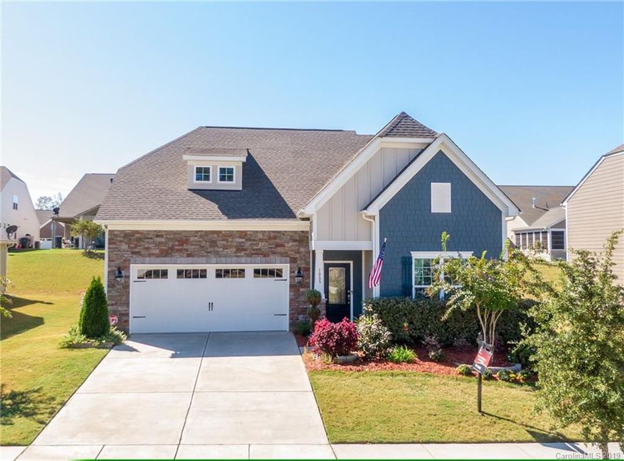 Looking for a home that has an owner's suite upstairs and down?? Look no further! This beautiful 4 bedroom 3.5 bath with an outdoor kitchen is a fabulous layout with all of the right spaces. An open floorplan with wood floors, gas stove in a huge kitchen equipped with ample cabinets and granite countertops for days, looks into the living room and breakfast nook that are tastefully decorated with plantation shutters. Your private dining room that is enclosed with french doors can also double as an office. The owner's suite downstairs has a tray ceiling, crown molding, a separate shower and soaking tub in the large master bathroom with his and her sinks and a massive walk in closet. Off of the loft area upstairs you will find a second owner's suite that is large enough to fit any size bedroom suit. You will also find a storage closet, two additional bedrooms and a guest bath. Outside you can enjoy your extended back patio with a built in grill, great for entertaining.