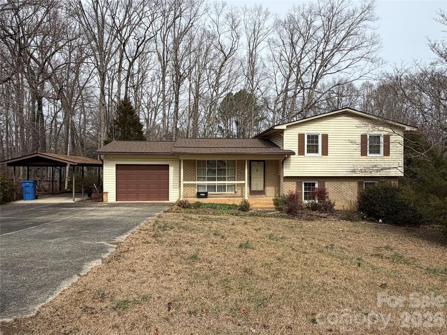 Great home on corner lot in established neighborhood. Downstairs, you will find a large living area with a potential fourth bedroom with full bath. Inside pictures to be uploaded this week.