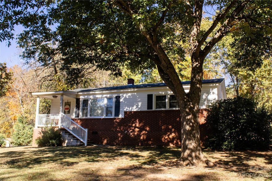 Welcome to Hickory Grove, SC! This hilltop home rests on a clearing of a semi-wooded 1 acre lot. It has 2 generously sized bedrooms and 1-large bathroom. The kitchen features multiple windows that fill the room with natural light, making it a bright and inviting place to spend time. The updated design and layout allow for easy movement and socializing, making it a perfect space for hosting dinner parties or casual gatherings. Adjacent to the kitchen is the dining area, The open concept design allows for easy conversation flow between the kitchen and dining area, creating a warm and inclusive atmosphere. With 2 generously sized bedrooms and 1 large bathroom, the layout of the bedrooms offers ample closet space, providing convenient storage for all your belongings. Don't miss out on the opportunity to make this beautifully designed living space your own! The charm of the country living truly shines through in this home.