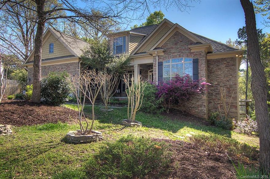 Custom built ranch with unfinished basement. Open floor plan with tons of upgrades. Granite countertops, stone backsplash, ss appliances in kitchen. Custom cabinetry & custom closets throughout. High ceilings w fans. Lots of molding. Coffered ceiling in sitting room. Large master bedroom with tray ceiling. Master bath with granite & garden tub. All appliances to stay. Unfinished basement for amazing possibilities, plus walk in crawl space. Tega Cay vacation lifestyle. Fort Mill Schools.