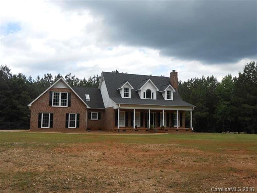 Come enjoy this brick home on almost 2 acs. Large country front porch, 2 sty foyer,9 ft ceiling downstairs, HW floors, den with built-ins and fireplace. Fml dining rm, kitchen with granite counter tops, stainless steel appliances, breakfast area with french doors that open to the deck. Master bedroom downstairs with large bathroom with dbl sinks, with granite counter tops, whirlpool tub, separate shower. 2 large bedrooms upstairs, and bath with granite counter tops. Large bonus rm over garage.