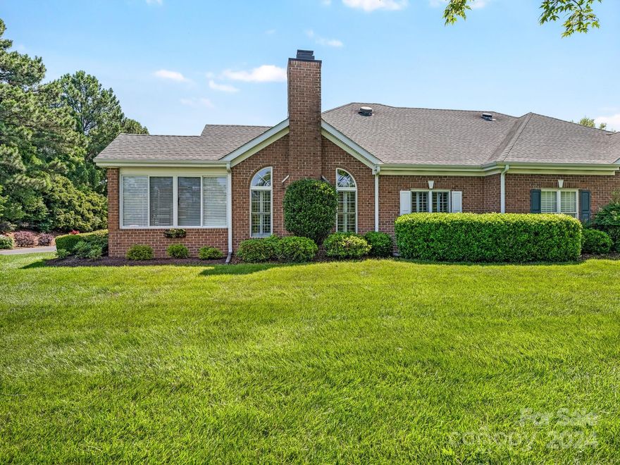 Introducing the Tranquility of Troon in the heart of Ballantyne w/in walking distance to restaurants & shopping. RARE end unit is one of the largest & features the coveted office/den living space & a well-designed kitchen boasting custom cabinetry, quartz counters, tasteful backsplash, & stainless steel appliances. Split bedroom floor plan rests under a cathedral ceiling & ceiling fan ideal for an evening by the fire. The coveted den/office space is the flexibility you need offering endless options & enjoyment. The sunroom is the perfect retreat for your morning cup of coffee & evening unwind as it overlooks your beautiful perennial garden & lush green grass. Large primary bedroom features a trey ceiling, ceiling fan, WIC, & a large primary bathroom with a dual vanity. The gracious guest bedroom has ample space for a guest or full time occupancy. The 500+sqft garage holds 2 cars, and has a closet for ample storage. 2020 Kitchen Remodel. New HVAC in 2022. New Hot Water Heater in 2023.