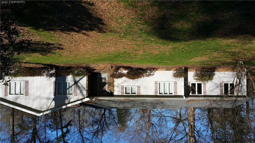 This 3 bedroom 2 bath house is filled with extras.  There is a brand new deck, the HVAC was replaced in 2010, as well as the roof, gutters, and vinyl soffetts have all been recently replaced.  The master bedroom has a large walk in closet, and an additional closet.  The living room is large and great for entertaining, also features a wet bar. The window treatments, as well as the shower curtains come with the house too. Must see. This won't last long.