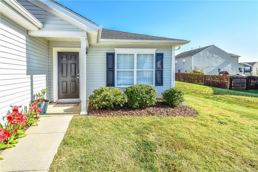 WOW! MOVE IN READY..  Very Cozy, Grand, open floor plan w/oversized great room Formal dining room right off the kitchen is convenient for entertaining! Eat in kitchen w/view of the gorgeous fenced backyard with large oversized deck.  Private master bedroom w/vaulted ceiling & ceiling fan. New Roof, New Paint!! Two car garage and so much more...