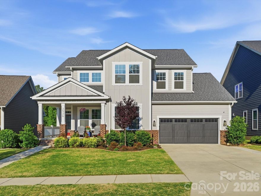 Welcome to this exceptional 5-bedroom, 4-bathroom basement home in the highly desirable Paddlers Cove community, where refined living meets everyday functionality. Ideally positioned near the end of Paddlers Cove Drive on a quiet cul-de-sac, this home offers added privacy and a peaceful setting.

Thoughtfully designed for both entertaining and daily comfort, the open-concept floor plan showcases a beautifully appointed kitchen featuring quartz countertops, a walk-in pantry, and a dedicated planning center, all seamlessly connected to the main living spaces. Just off the garage, a well-placed drop zone provides effortless organization for busy lifestyles. The main level also features a private office and a guest suite with a full bathroom, perfect for visitors or multi-generational living.

Upstairs, you’ll find a spacious and versatile layout featuring the primary suite, two additional bedrooms, a loft ideal for a secondary living space or home office, and an oversized laundry room designed for maximum convenience.

The finished basement expands your living space with an oversized recreation area, an additional bedroom, a full bathroom, and a large unfinished storage area, offering flexibility for both living and future needs.

Step outside to your private outdoor retreat, where a screened-in porch overlooks a serene, tree-lined backyard and a heated saltwater pool, creating the perfect setting for relaxing evenings or entertaining year-round.

Enjoy resort-style community amenities, including a neighborhood pool, all while being just minutes away, and even a golf cart ride, from top-rated schools (Crowders Creek Elementary, Oakridge Middle and Lake Wylie High School) and Field Day Park. 

Offering the perfect blend of luxury, privacy, and convenience, this home truly has it all.