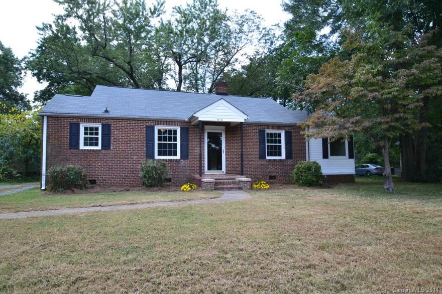 Amazing home in the heart of the Arts District! Enjoy living in this adorable brick home - refinished hardwoods throughout, many updates, huge yard and WALK to all that NoDa has to offer. While home has many updates, it still has much of the original charm: original doors and glass hardware, black and white tile in bathroom, arched doorway, woodburning fireplace, and more. Home has been in the family for 15 years and they were recently renting it for $1350 - a great investment all around!