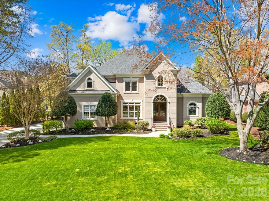 Step into a world of elegance and recreation with this stunning home in The Peninsula Club, a highly sought-after lakefront community. Nestled on almost .50 acres this property allows for effortless entertainment. The recently updated gourmet kitchen, equipped with quartz countertops, custom cabinetry, a large center island, built in side by side refrigerator and top-of-the-line appliances. Don't miss the convenient bar area adjacent to the dining and living rooms that makes hosting gatherings a breeze. The 1st floor primary offers tranquil views of the gorgeous backyard, 2 walk-in closets, and a beautifully updated bathroom.  Upstairs, you’ll find 4 generously sized additional bedrooms, 2 baths, and a versatile bonus room. This home features thoughtful upgrades including 2 laundry locations, a new Tesla charger and a new roof (2023), ensuring convenience and modern living. Imagine the potential for your backyard oasis with preliminary pool approval from the HOA already in place.