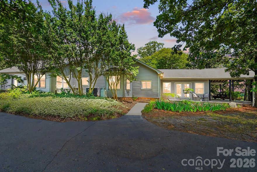 Wow! Stunning Lakefront Estate on Over 6 Acres in the Sought-After Piedmont School District!
This one-of-a-kind property offers privacy, space, and breathtaking views from every angle. A long, tree-lined driveway welcomes you to your own private retreat, leading to a beautiful covered deck overlooking a serene, spring-fed and fully stocked lake—complete with a custom stone smoker, perfect for entertaining and relaxing outdoors.

The property is a dream for hobbyists, nature lovers, or anyone seeking a multi-use estate. Outdoor highlights include a 4-stall Building, chicken coop, RV site, farmed field along driveway, detached 2-car garage, plus pass-through garage, workshop, and an additional 3-car garage with 200-amp service and a wood stove—offering endless possibilities for projects, equipment, or small business use.

Inside, the home features a chef’s kitchen with a Viking range, Corian counters, ample cabinetry, and an enormous pantry. The vaulted living room and vaulted game room showcase gorgeous natural light, a stunning 2 story wood-burning stone fireplace, and beautiful lake views that bring the outdoors in.

The main level also offers a spacious primary suite, plus two additional bedrooms, a full bath, and a flexible in-law or business suite with a private entrance—ideal for guests, a home office, or multi-generational living.

Upstairs, you’ll find two more large bedrooms and another full bath, providing plenty of space for everyone.

Whether you’re seeking a peaceful country retreat, an entertainer’s dream, or a functional homestead with modern comforts, this property truly has it all. Come relax by the lake, watch the sunset from your deck, and experience the perfect blend of tranquility and luxury.