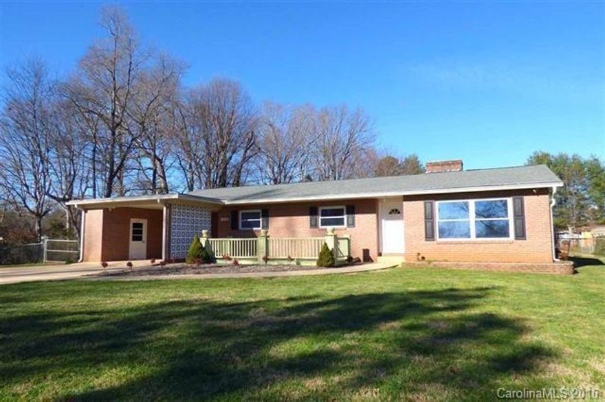 Updated brick ranch offering over 1600 HSF, 3 bedrooms, 20x36 detached workshop/garage, and 0.59 acre fenced lot! Located on quite street in Crestview Heights, classic 1960s home offers welcoming foyer, sunken living room with fireplace and lots of natural sunlight, formal dining area, and large eat-in kitchen with updated countertops, flooring, cooktop, dishwasher, and more! Central hallway leads to 3 bedrooms and hall bath. The master bedroom offers a convenient half bath with large vanity.