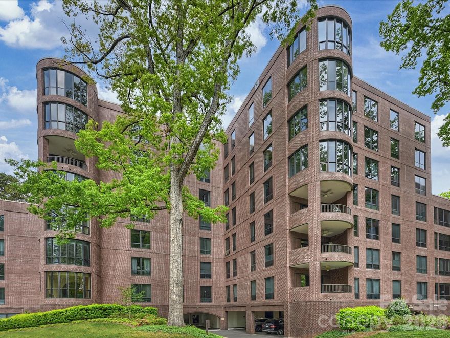 Fabulous fourth floor unit overlooking the swimming pool and gardens located in the heart of Eastover. This unit was renovated and designed by Susan Dudley. All white kitchen with marble countertops and backsplash, stainless steel appliances, custom built-in cabinetry, beautiful area that can be your butler's pantry or bar area including a beverage refrigerator. Hardwood floors throughout except the bedrooms, spacious Living room with fireplace that opens to the Sunroom and Dining room, updated recessed lighting, custom built ins, small Office, and Sunroom. Beautiful light throughout and views that no other unit offers of the gardens and pool. Noted features include a security guard, assigned parking spot in covered garage & plenty of extra parking for additional cars and visitors, gas and water included in HOA. In addition there is a  large community room"The Cherokee Room" that has a full kitchen and 2 bathrooms for events and parties that is available to all residents. This unit will not last long!