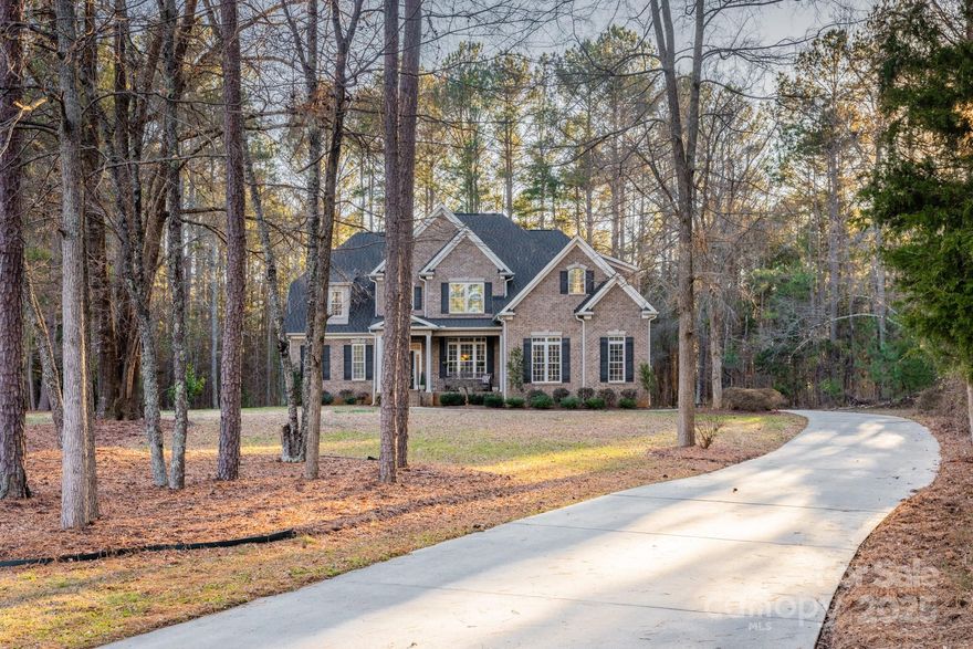 This stunning custom-built brick home sits on 1.73 acres in the sought-after Regal Pines Subdivision on a quiet cul-de-sac. The grand two-story foyer opens to a spacious living area with a fireplace, cathedral ceiling, and elegant details like crown molding, chair railing, and wainscoting. With 10-foot ceilings downstairs and 9-foot ceilings upstairs, refinished hardwood floors, and new carpet, the home feels open and inviting. The kitchen boasts granite countertops and brand-new high-end appliances, while two upstairs bedrooms feature bonus storage areas. A massive walk-in attic offers potential for additional living space, and a flex room is perfect for an office or gym. The backyard is built for entertaining with a patio, covered cooking area, fire pit, and jacuzzi. Enjoy peaceful strolls through the wooded lot behind the home. If you’re looking for comfort, elegance, and serenity, this is the one! Don’t wait—schedule your showing today!