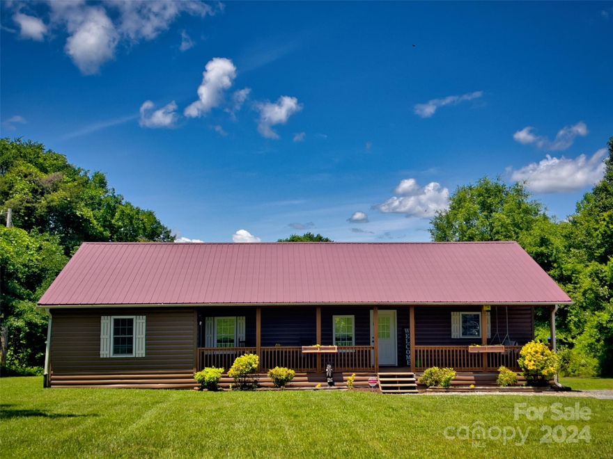 Welcoming and charming home in the country. Unrestricted, private and with over 1.5 acres allows for a mini farm or homesteading in your own backyard. Kitchen boasts updated cabinetry, butcher block counters, farmhouse sink and stainless appliances. The spacious primary bedroom has updated en suite bathroom and direct access to the large back deck. Second bedroom is generously sized and has private access. There is a bonus room off the kitchen that could be used as an office or converted to a fourth bedroom if desired. Outside you will find a 24X36' outbuilding that has power. It had a bathroom in the past and some of the plumbing is still there. There is a camper spot on the woods line but power is not currently connected to the box. Fast growing evergreens have been planted at front of property to add even more privacy in the future. This home was originally a single wide mobile home but has been completely renovated and added on to in a craftsman like manner. Must see to appreciate!