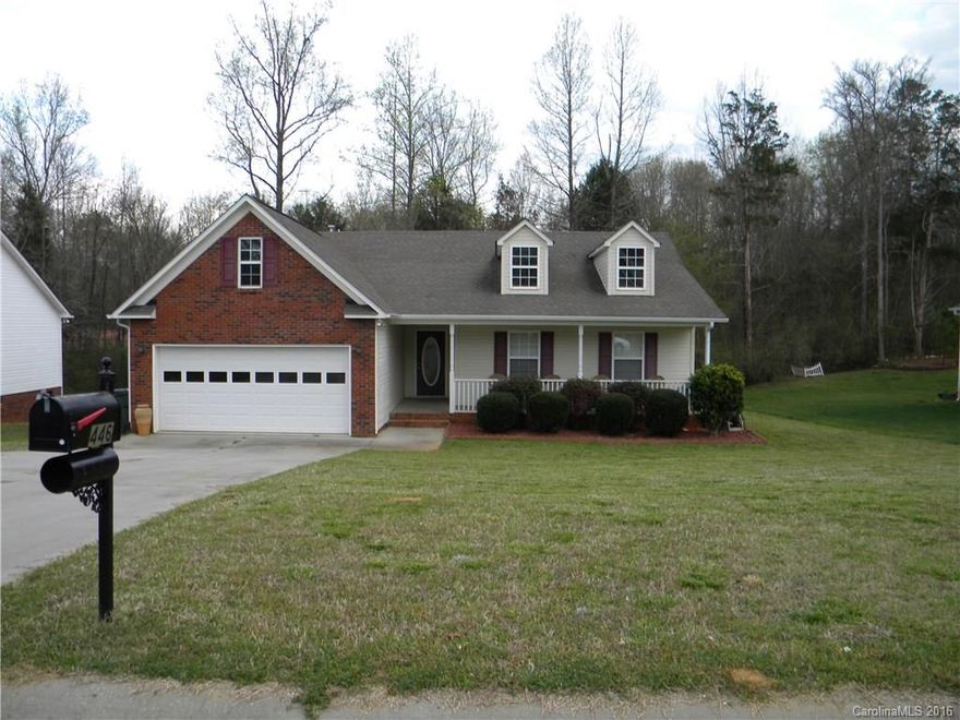 Relax in the country and enjoy the wonderful rocking chair front porch, open and airy home with vaulted ceiling, corner fireplace & gas logs, lovely hardwood floors, great kitchen with large breakfast/dining, laundry room off garage serves as a utility room/mud room too, very private back yard and a storage shed for all the extras. Property also has a water filtration system, not needed but wanted by owner. Ready to move in!