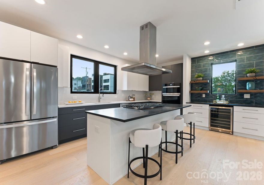 Last opportunity to own one of the State Street Four! Brand new townhome in the booming neighborhood of Seversville. Steps away from the Stewart Creek Greenway & Savona Mill, this home offers a single family feel and direct access into Uptown Charlotte, Southend & is 10 minutes from Charlotte Douglas International Airport. This home features engineered hardwoods throughout with designer tile in all bathrooms, 36" gas cooktop with Zephyr range hood, built-in wall oven/microwave, stainless steel appliances, walk-in pantry, electric fireplace, main level balcony, downstairs kitchenette/wet bar with second laundry hook-up, oversized walk-in closets for primary & guest bedroom, primary bath soaking tub & rainfall shower, floating shelves & an electric fireplace. These units have an energy efficient HVAC with whole-home dehumidifiers. The rooftop terrace is over 900 square feet of an entertainers dream: wired for a hot hub, plumbed for an outdoor kitchen & includes a gas line. Schedule your tour today in one of the fastest growing neighborhoods in Charlotte!