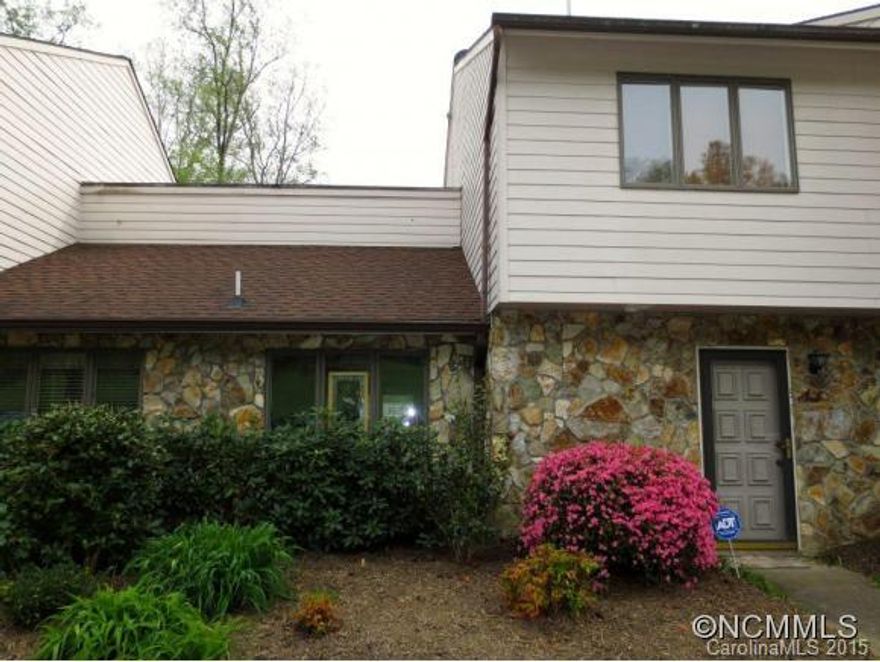 Updated townhome in a park-like setting. Brand new Trane heat pump, stainless appliances, cork, cherry and tile flooring, gas log fireplace, alarm system and easy access. Sit on the back patio and listen to bold Scotts Creek. This is a deal and won't last long.