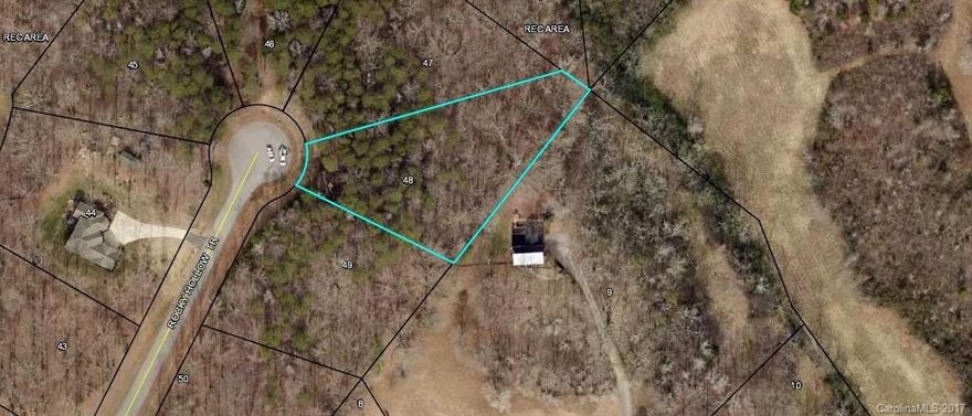 PRICE SLASHED ON REMAINING 3 LOTS! Small, unique neighborhood with 1+ acre lots. Nature lovers will enjoy the walking trails, fishing pond, and picnic area. Near great Clover Schools.  Low owner occupied tax rate when home is built. Bring your own builder or use one of ours. Low HOA fees.