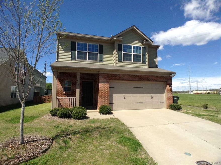 Well-maintained 2-year-old home near shopping, dining, schools & more! Wood laminate floors & detailed moldings. Great room flows into breakfast & kitchen w/granite counter tops, SS appliances & pantry. Breakfast bar w/lots of room for stool seating. Sliding doors access fenced back yard w/patio. All 3 BRs up, along w/loft & laundry. Master suite boasts tray ceiling, large walk-in closet, bath w/extended vanity & linen closet. Cabinetry & sink in 2-car garage. Easy access to I-85 & Harrisburg!