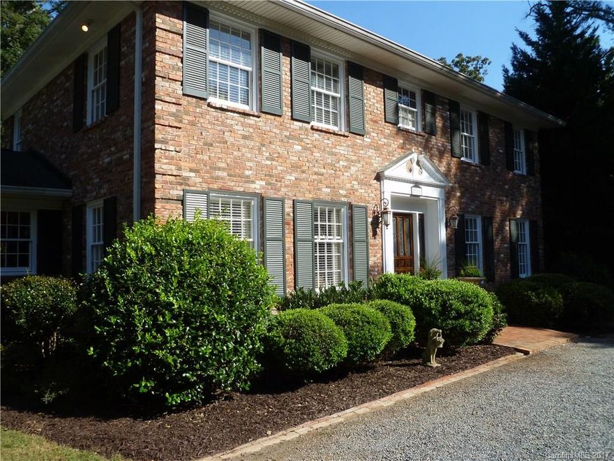 Beautiful, stately home conveniently located in SE Charlotte's MoRa community. The home features leaded glass front doors; dental molding; hardwood floors in foyer, living, dining room & throughout the second story. It also boasts a finished basement perfect for guests or in-laws that includes a bath, bedroom, living area and mini kitchen. Recent upgrades are new hot water heater '15, newer roof '10, with fresh paint inside & out. The garden & outdoor seating areas are perfect for entertaining.