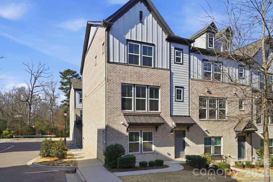 Move-in ready, end unit townhome now available in desirable Cotswold - an established Charlotte neighborhood that somehow seems to keep growing! Whether you want to enjoy a night in or entertain, you are sure to feel "at home" in this beautiful, single-owner, 2019 build. You will love the open-concept floorplan featuring a gourmet kitchen with gas range, wall oven & microwave, huge four-seater island, walk-in pantry AND extra hall closet - no storage shortage here! The dining area with two opportunities for bar/storage nooks flows seamlessly to the open living room with tons of natural light & a cozy fireplace. This beautifully maintained three-story townhome offers ultimate privacy for all starting with the first-floor office/guest suite + full bathroom, and not one, but TWO generously-sized primary suites on the top floor, each complete with walk-in closets, ceiling fans, tray ceilings, & double bathroom vanities. This location is hard to beat: the 30-acre Randolph Road Park 0.5 miles/approx. 10-minute walk down the road; Cotswold Village feat. two grocery stores, shopping, & dining just one mile away; and South Park, South End, Uptown Charlotte all within a short drive. This Wendwood Terrace property is perfect for those looking for central, low-maintenance living & ultimate convenience. HOA dues include exterior maintenance, water/sewer, & community dog park. Schedule your tour today!