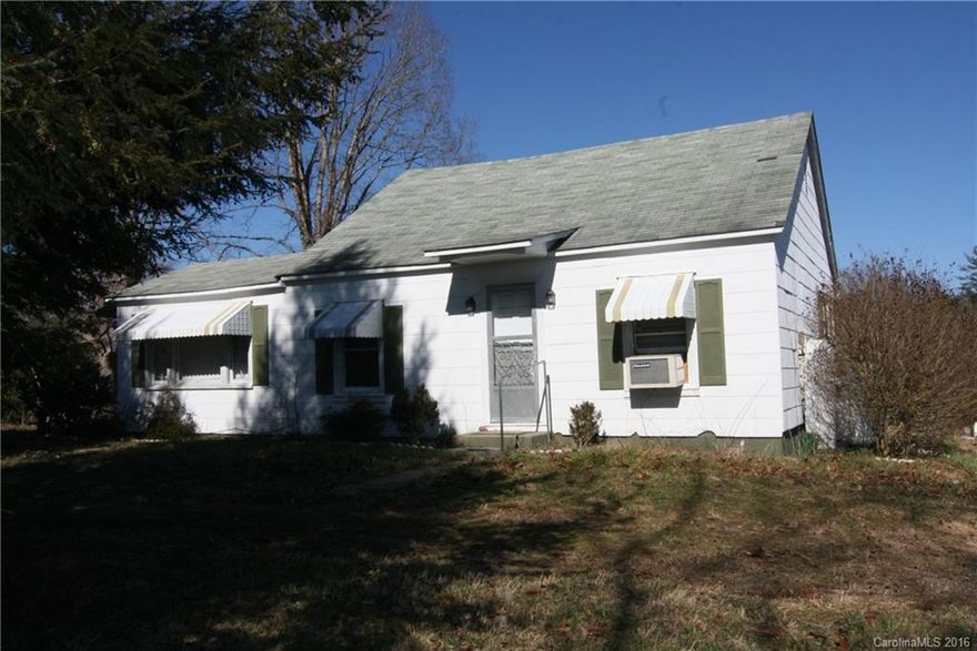 Bring the horses !!  this property is ideal for creating a great equestrian facility, with Approx. 18 acres the potential is good for pastures and trails. the horse arena is nice and level, some fencing is in place along with some metal panels. house has had some updates. heat source is a stand alone propane heater in the living room.2 bedroom 1 bath with hardwoods in some rooms. Kitchen has plenty of room. cozy screened in porch over looking the beautiful mountain range Large shop /Barn