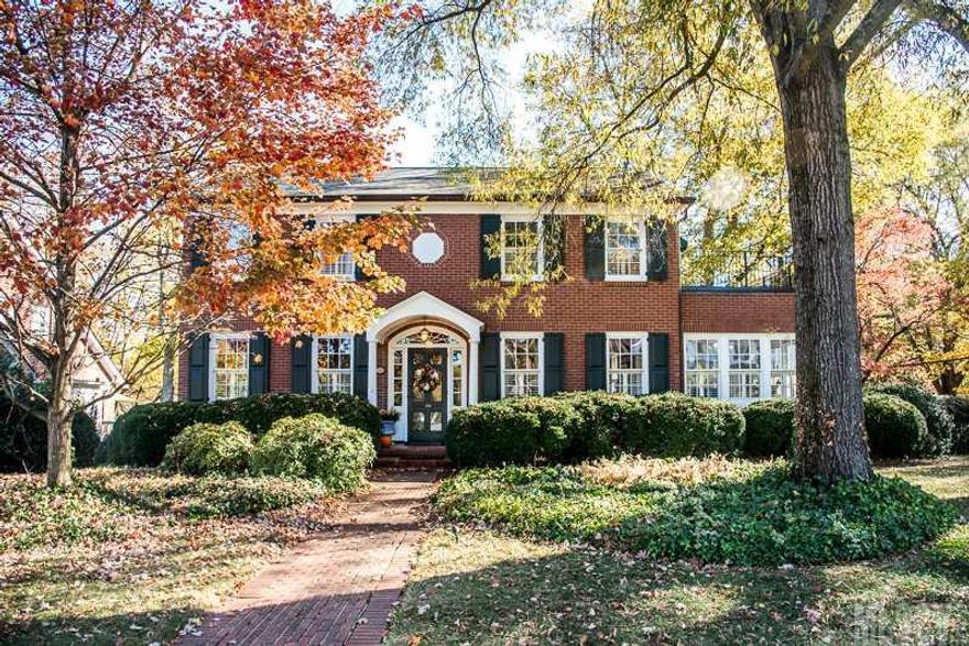 Beautifully remodeled historic home. Eat-in kitchen with marble counters, double oven induction cook top with pantry & laundry area. Opens to dining room. Main level bedroom with remodeled bath & large closets opens to covered porch will make a great master or guest room. Living room opens to sunroom. Second level boasts master bedroom with newly remodeled bath. Two additional spacious bedrooms & full bath. Basement level has den, double garage, storage & workshop area. Whole house generator & copper gutters. Flat roof replaced with new drain system 2016. Master remodeled 2016.