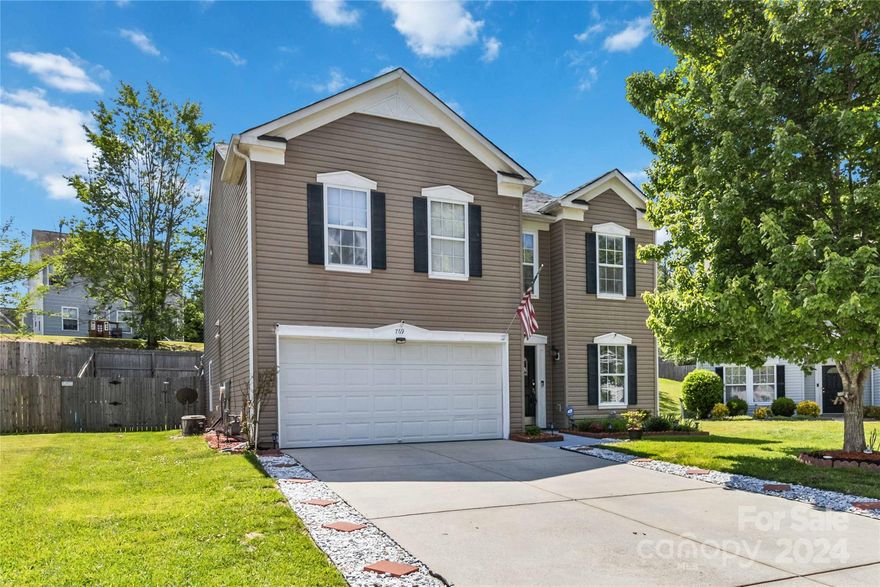 **UPDATED PRICING ON THIS NICE HOME IN CLOVER ISD** This home is nestled in a serene cul-de-sac in award winning Clover ISD.  The entrance includes a spacious and inviting open plan layout, ideal for entertaining and enjoying family time. The main floor features shiny hard flooring throughout, offering both durability & effortless maintenance.  Recent updates include granite countertops & lighting fixtures throughout. Spacious kitchen includes all SS appliances and the refrigerator remains.  Outdoor grilling is made easy w/access to the covered back patio via the kitchen.  Upstairs you'll find 3 carpeted bedrooms, loft space and a laundry room.  Enjoy privacy with the manicured lawn & fenced yard.  For eco-conscious homeowners, you'll appreciate the convenience of your very own electric vehicle charging station installed in the spacious and fully painted garage.  You'll also get these smart features Nest Ring doorbell CO monitor & a 1 year home warranty.