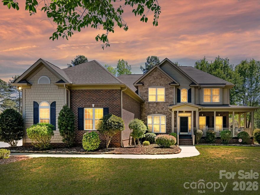 Arrive Home to your Peaceful and Serene Surroundings close to Lake Wylie! Wonderful Curb appeal enhances this lovely home on over 1 acre lot. CAR ENTHUSIASTS will LOVE all the SECOND GARAGE! Home has Attached Three Car Garage PLUS SECOND GARAGE with 815 SF that can fit 2-4 more cars! MUST SEE! Relax in the Screened Porch that views Tall Mature Trees, Large Stamped Patio, Covered Trellis for your Swing, and Beautiful Landscaping! Fenced yard too! The interior has recently been painted. Two Story Foyer leads to Living and Dining Rm. Wood Flooring and Crown Moldings in most main level rooms. Dramatic Vaulted Great Room with Gas Fireplace and Custom Mantle. Open Concept from Kitchen to Great Room for ease of Entertaining. Kitchen Boasts of Glass Front Cabinet, Gas Range & Breakfast Bar. Primary Bedroom on Main w/Tray Ceiling, Corner Garden Tub and Separate walk in Tiled Shower. Staircase to Upper-Level boasts of Wood Treads & Iron Balusters. Enjoy all the Space offered on this level! Three additional Bedrooms, Two Full Baths, Flex Room and a Large Bonus Room/Media Rm and Multiple Walk-in Storage areas! Wonderful Schools & Low Taxes, Your Opportunity to own a full brick home, 5 car garage, and One Acre Lot close to the Lake Wylie!