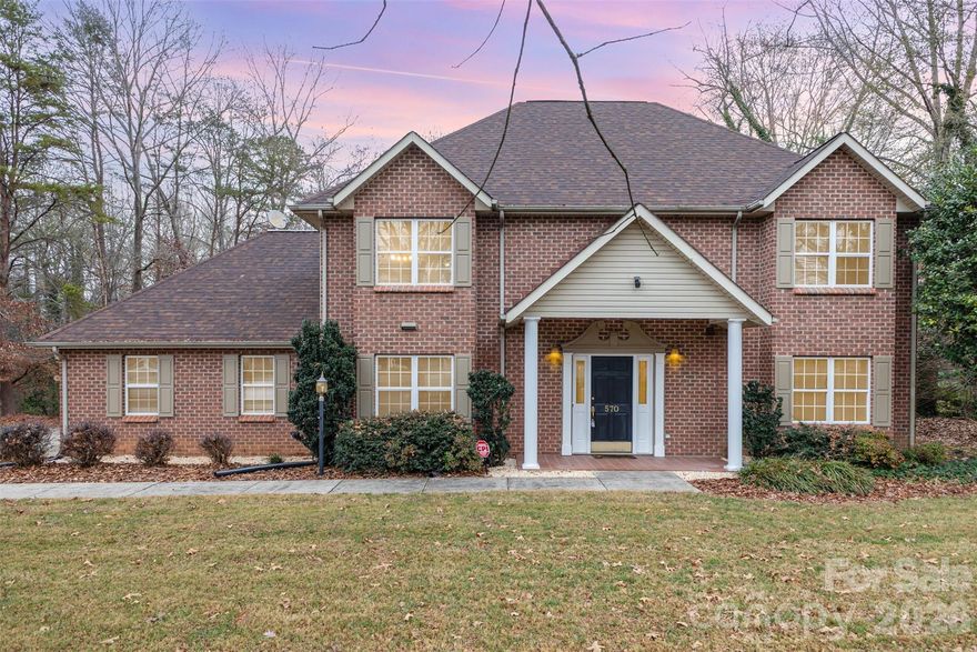 HICKORY NC this bright, spacious, and perfectly placed 4-bed, 3-bath beauty checks every box: new flooring & fresh new paint! Completely renovated kitchen. The heart of the home is a generous kitchen with a center island, bar seating for extra guests, and a handy built-in desk to keep life organized. The great room impresses with a cathedral ceiling, a cozy gas-log fireplace, and French doors that open to a fabulous deck overlooking a level, usable backyard—ideal for play, pets, or entertaining.
The primary suite is a true retreat with a private bath and two walk-in closets. Three additional bedrooms offer flexible space for family, guests, or a home office. With thoughtful storage, comfortable flow, and a conveniently location close to grocery, shopping center and restaurants. This is an easy home to love and an even easier one to live in. *Virtual stage in use*