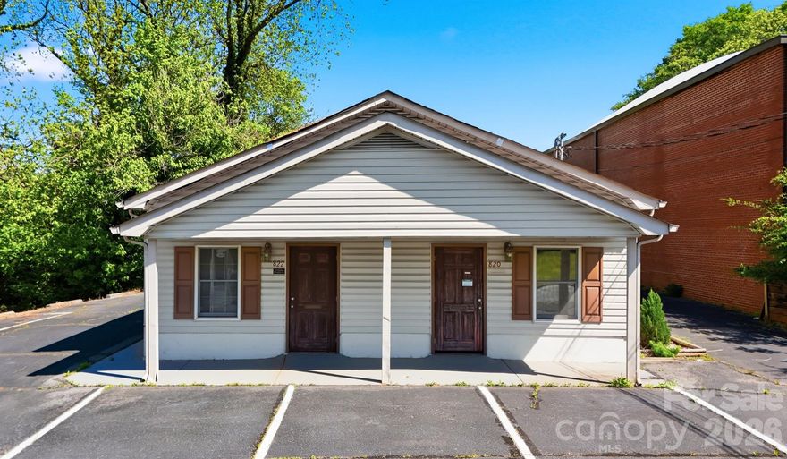 Office building in great downtown Hickory location -- short walk to the City Walk and Union Square. Office building with two front entrances and potential reception areas. Two bathrooms. Small kitchenette. Conference room space. Zoned C-2 so plenty of options for you!