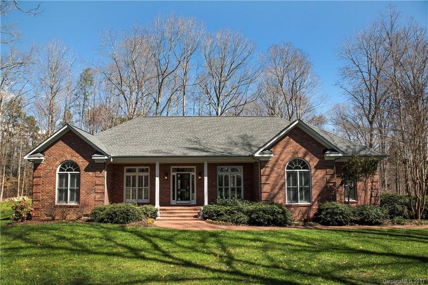 AWESOME custom brick ranch on 11 acres close to Ballantyne. This open, split bedroom home boasts 9 ft. ceilings with vaulted bedrooms. Floor to ceiling windows with custom plantation shutters. Gleaming hardwoods and stunning sunroom. HUGE open, eat in kitchen w/ SS appliances. Central vac, tons of storage, optional fuels, custom wiring, tankless hot water, ETC. 2nd living quarters with full bath, kitchen and carport. Stocked pond, 2,640sf building with H2O and electric.SEE ATTACH. FOR MORE INFO!