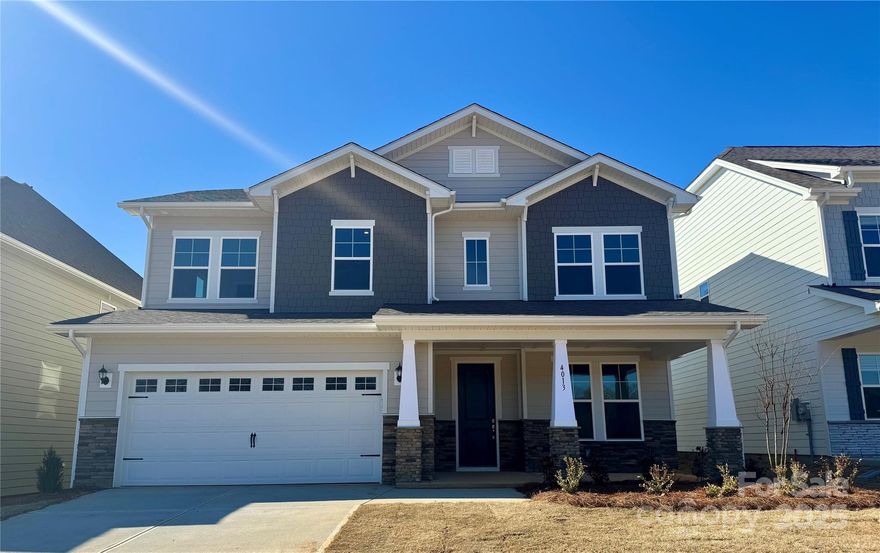 Welcome home! In the beautiful town on Indian Trail, you will find the BRAND NEW COMMUNITY Moore Farms. The Millbrook plan, offers 5 bedrooms with 4 full baths. This home features a guest suite on the main floor, large family room with a fireplace, as well as a large dining area, perfect for gathering. The kitchen features Quartz countertops, oversized walk in pantry, large eat in bar, with a gas range, microwave, and dishwasher. Your primary bedroom features a walk in closet, double vanity with quartz countertops, with your laundry room right outside of your room. Upstairs features a ginormous loft with 3 full size bedrooms with walk in closets, one featuring their own full bath. With quick and easy access to HWY 74, HWY 485, shops and dining, this home is perfect for you! Call us today to make this home yours, it will not last!