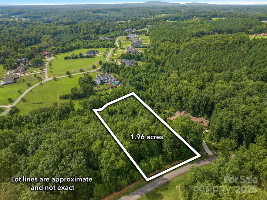 An exceptional opportunity in one of the area's most sought-after gated neighborhoods, Pinnacle Ridge. Surrounded by stunning estate homes valued at upwards of $2M, this 1.96 acre wooded lot offers the perfect blend of privacy, natural beauty and luxury living. The gentle topography is ideally suited for a walkout basement design, creating a seamless balance of functionality and architectural style. Imagine evenings on your back porch taking in the long range 'mountain-like' views or entertaining around your future pool on the thoughtfully proposed site layout. It's a blank canvas ready for your dreams to unfold. Conveniently located 30 minutes from Uptown Charlotte, 30 min from CLT Airport and only 20 minutes from Birkdale Village. Pinnacle Ridge is just minutes to Lake Norman where you can join a boat club or Verdict Ridge Golf Course where you can play a round of golf. Preliminary soil & survey work has already been complete and verbally approved by soils engineer for a five-six bedroom home.  You'll love living here! Low Lincoln Co taxes. Bring your own custom builder-It's time to make your dream a reality. Please inquire about plans that include home, ADU and pool design. This lot is one of the last remaining lots in the community and a true GEM!