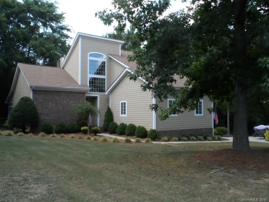 LOCATION, LOCATION, LOCATION - Peaceful custom home on 1 ac. lot on the NC/SC line with low Fort Mill taxes and Fort Mill Schools.  No HOA so park your boat/RV on the parking pad.Sit on your deck & enjoy nature. Kitchen has SS appliances, quartz countertops, ceramic tile floors.  Large MB w/shower & arge whirlpool tub.  Lots of updates, fans, lighting, guest bath remodeled, Nests smoke dectors, & crawl space w/Dry pro encapsulation w/Dehu & wireless monitor & transferable warranty and more.