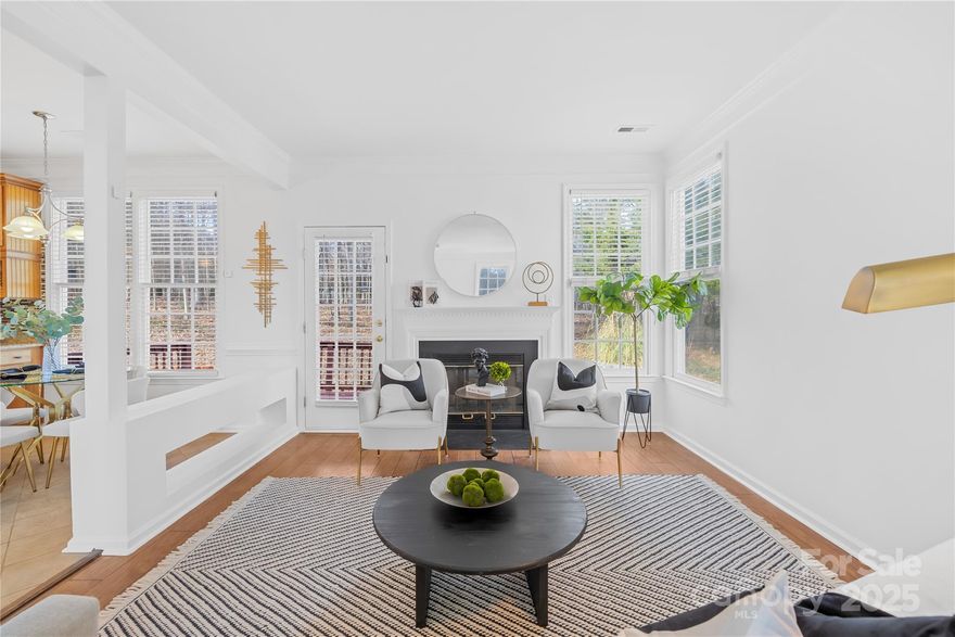 Welcome home to this 4-bedroom, 2.5-bathroom home located in the desirable Keswick neighborhood of Regent Park, Fort Mill. The cozy living room features a fireplace, and the kitchen comes with granite countertops and stainless steel appliances. A half bath is conveniently located downstairs. Upstairs, the home is beaming with natural light from the many skylights. The primary suite is a true retreat with a spacious en suite bathroom and a walk-in closet. The fourth bedroom can also serve as a versatile bonus room to suit your needs. The entire home has been repainted and the carpet has been replaced! Situated on almost half an acre in a community known for its top-rated schools and community pool this home offers the perfect environment for families. Don't miss this opportunity to live in one of Fort Mill's most desirable neighborhoods!