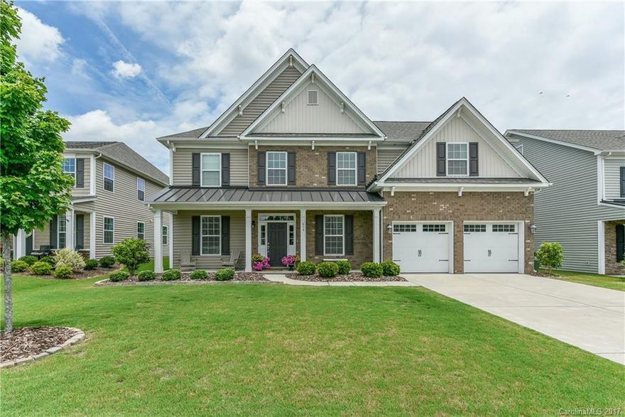 Beautifully updated, well-maintained home with kitchen island, SS appliances, walk-in pantry.  Relax in your 2 story great room or grill on your paver patio with fenced yard.  This home features a main floor guest suite/in-law suite.  Upstairs master, 2 bedrooms and 5th bedroom/bonus room.  Amenities galore --a 7,500 sq. ft. Timberlake-style clubhouse, a five-lane competition pool and kiddie pool with water slide, two tennis courts, a multi-purpose court and playground area, and walking trails.