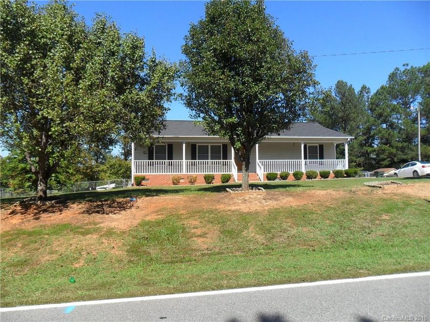 Spacious one level home on a corner lot.  Fully fenced backyard with a covered rear deck.  Newer roof and HVAC unit.  Fresh paint and carpets just cleaned.  Country living but still convenient to the city.  Don't miss out on this gem!