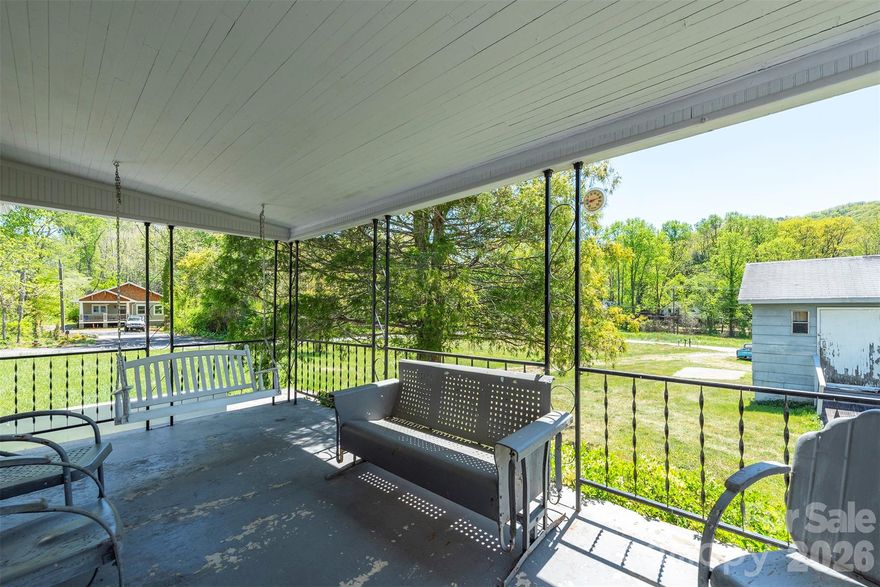 Tucked away on a quiet street in one of Western North Carolina's most beloved small towns, this cozy 2-bedroom, 2-bathroom home is the perfect blend of comfort and convenience. 
Step outside onto the covered porch and breathe in the fresh Blue Ridge air — whether you're sipping your morning coffee or winding down after a day of hiking, this outdoor space instantly feels like home. The attached carport adds everyday practicality, offering secure parking, or extra storage. Large detached workshop ideal for projects, hobbies, and equipment storage.
Set on a 0.31-acre lot, the property offers just the right amount of outdoor space without the upkeep of a larger parcel — ideal for low-maintenance living without sacrificing that tucked-away mountain feel.
All of this just minutes from the vibrant downtown Black Mountain — boutique shops, local restaurants, art galleries. With easy access to hiking trails, fly fishing, golf courses, and mountain biking. 
Best of all, the home is being sold fully furnished, making it an effortless primary residence or a turn-key mountain getaway.