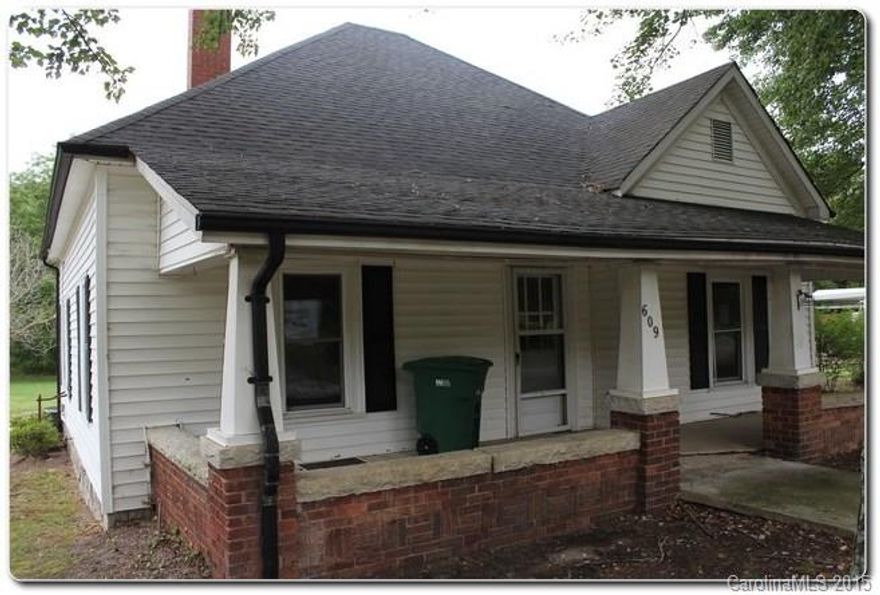 Charming Bungalow in Granite Quarry! Great curb appeal with this home that features bungalow style architecture. Rocking chair front porch with large columns and brick accents, covered deck in back that could be easily screened in. Historic floor plan on interior with great fireplace mantle and built-ins, large kitchen with breakfast bar, spacious bedrooms. Great level backyard with shed. Tax Records state 3 bed/1.5 bath.