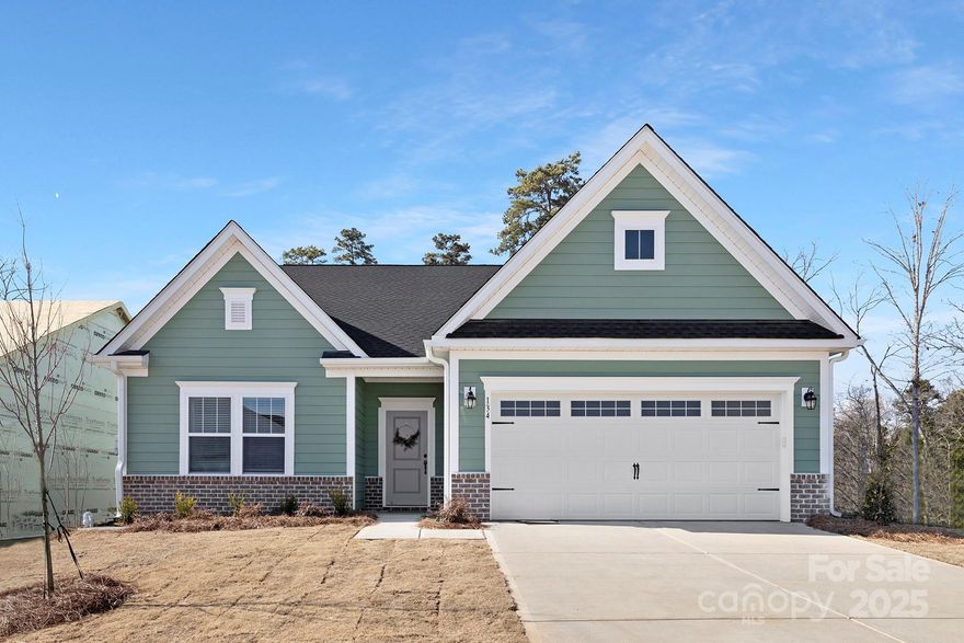 Ready NOW! 3BR / 2.5 BA RANCH in desirable Lake Tillery community! The Vale features stylish kitchen with upgrades, spacious great room and open dining! Kitchen boasts tile back splash, quartz countertops, SS appliances, and large pantry. Spacious owner's suite features dual-walk-in closets and ensuite, along with spacious secondary bedrooms and additional full bath. Many upgrades throughout home as well as rear covered porch, perfect for entertaining!

The Tillery Tradition Country Club, the hidden gem of the Uwharrie Mountains, is a beautiful 18 hole course Also onsite is the gorgeous Tillery Tradition Clubhouse complete with it's own restaurant - The Eagles Nest. The country club also features lots of beautiful and relaxing outdoor seating and gathering spaces as well as a large swimming pool for those hot summer days. Membership to country club is separate; golf course and pool are NOT included with the HOA dues.