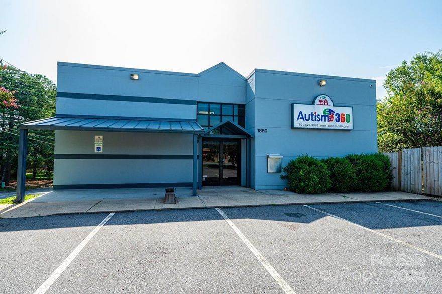 Prime location, corner lot, on a main Hickory corridor is now available for Lease or Sell.   1880 North Main Street (aka Hwy 127) is in the heart of Viewmont.  6220+ Square feet was most recently used as an Learning/Development Center for children.  Built in 1991, building was originally a bank, complete with drive thru lanes and a huge vault.  Those things are still in place and you could get creative with how you purpose the vault!      Total acreage on the two parcels being sold is 0.80 acres.  Parking in front AND behind the building.  Upstairs space has high ceilings, open areas, offices, restrooms and a kitchen!  Take the flight of stairs to the lower level where you will find more offices/class rooms, meeting spaces, larger restroom, kitchen area and a large double door out to the parking area.  Hickory, NC is a great place to live, work, play and grow a business.  Come take a look!