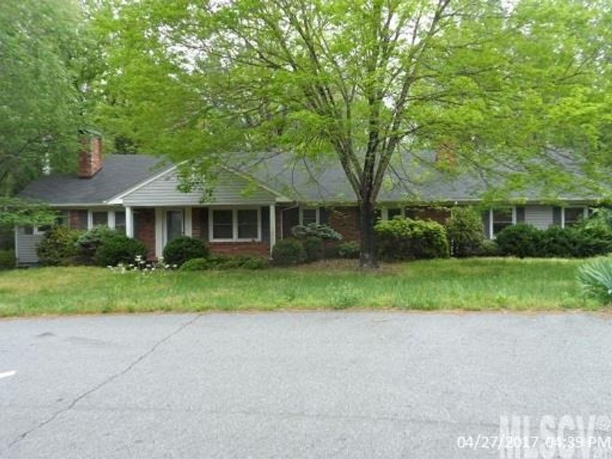 Lots of square footage for this price in a great neighborhood and convenient to Hwy 421. One level living, with a 3 car garage and extra bedroom, bath and kitchen. Lots of nice moulding and china cabinets within the library and office. Home is in average condition but could use a roof, and some minor cosmetic repairs Could also use some new carpet in the bedrooms. There appears to be some moisture in the basement and possibly a problem with the heat pump. Please do not walk on back deck. It needs repair. Seller and or its agent make no representation to condition of property expressed and or implied. Sold as is.