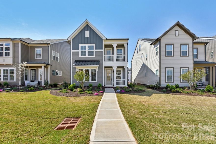 A TRUE Master Plan Community - reduced and move-in ready. This is more than a place to live, its also a destination! Our stunning 2-story home offers primary suite with a spacious sitting room and private balcony, plus there are two over-sized closets. This home's is beautifully curated interior design finishes are individually hand picked by our design team! This open floorplan makes a great space for entertaining, or spending quiet evenings in! The front overlooks a lush common open space and is a stone's throw to the mail boxes. Location is key, and here in the River District, you are minutes from everywhere! The community itself will offer everything from pool, parks, trails to a working 2 acre farm with on site farmer to river front amphitheater and everything in between!