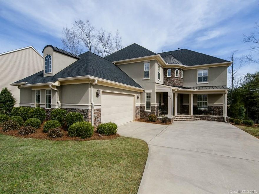 Must see home in Mill Creek Falls! Beautiful stone front porch welcomes you to this gorgeous open floor plan home. Hardwood floors throughout main living area, formal dining room and breakfast area. Granite counters in kitchen, tile back splash and center island with sink. Master retreat down with sitting area and soaking tub. Bonus up with four additional bedrooms. Stunning backyard oasis with screened porch, mounted TV over stone fireplace and tile flooring. Water view of large community pond.