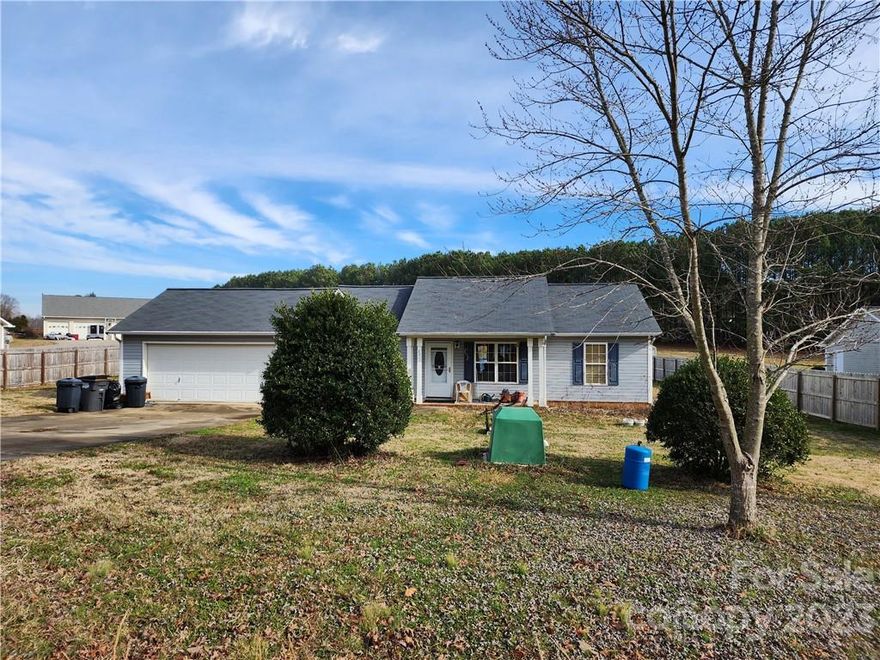 Charming 3 bed 2 full bath home feels like country but just minutes from Mooresville! The covered porch invites you into the front door. Inside you will find an open living room dining room with a split bedroom floor plan primary to the left, and guest bedrooms to the right. Primary has it's own full bath, second full guest bath located between the guest bedrooms. Walking through the kitchen will bring you to the office that is attached to the 2 car garage. This one won't last long! Price reflects minor cosmetic repairs that the home will need. Seller will not make any repairs, home is sold AS-IS. Home is in Kilborne Subdivision, just waiting on an update to the pick list.