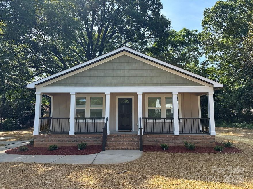 Beautiful New Construction in Downtown Monroe! 3 bedrooms, 2 bath close to dining, shopping, hospital and all the fun downtown activities. Spacious Living Room with Large Eat-in Kitchen. Stainless appliances include refrigerator. Full front porch and side deck. Beautiful mature trees on half acre lot. Thanks for showing.