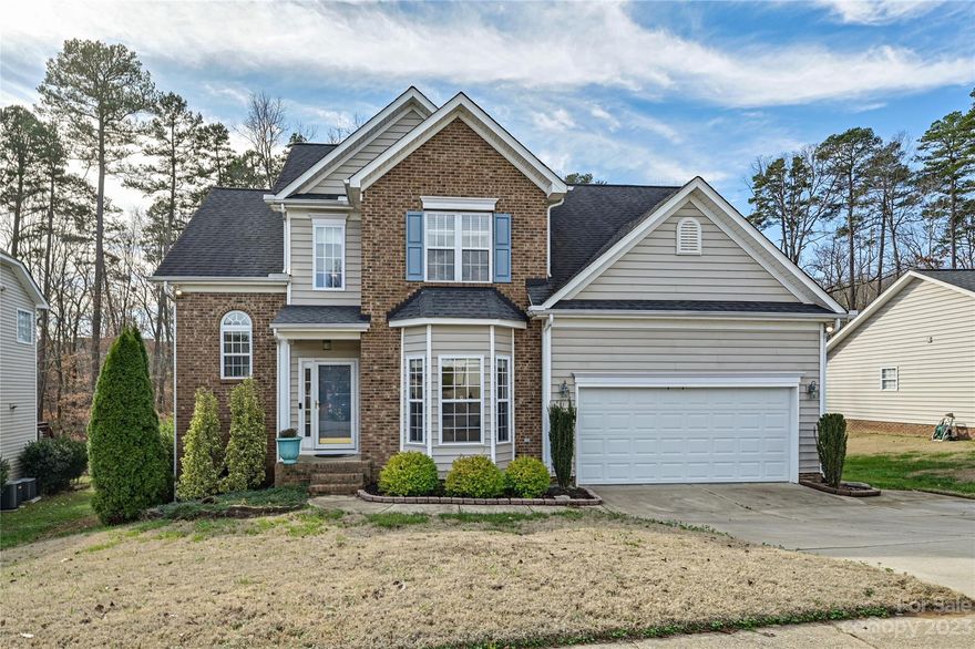 Waterfront home on over half an acre of land-a rare find! Enjoy the seasonal water view of the Catawba River from the backyard, or get in your kayak or canoe and take in the beauty! Community amenities include clubhouse, pool, playground, tennis courts, walking trails, marina & more! The main floor features a formal dining room/study, the primary bedroom/bathroom with walk-in closet, powder room, 2 story great room with gas fireplace, laundry room, kitchen, & breakfast area. Upstairs you will find a full bathroom and 3 bedrooms, one of which is very spacious and could double as a bonus room, theater room, or playroom! Backyard has shed with electric. Some newer features in the home include a new water heater in 2023, new microwave in 2023, upstairs HVAC and circuit board replaced in 2021, carpet replaced in 2021, floors in the primary replaced in 2021. Within 15 minutes of the US National Whitewater Center & the Charlotte Douglas Airport!