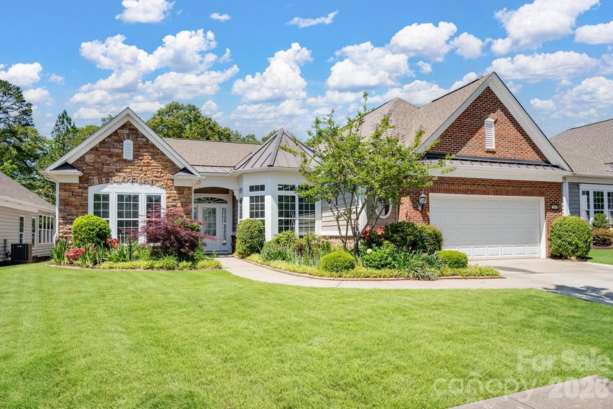 Welcome to this beautifully maintained Cumberland Hall model in the highly sought-after Sun City Carolina Lakes community. 

Just off the entryway, double glass doors open to a private home office or study - perfect for remote work, hobbies, or a quiet retreat. As you move down the hall accented with classic wainscoting, the home opens into a bright and airy great room filled with natural light from a stunning wall of windows. A gas log fireplace with picture frame molding creates a warm focal point, while the adjacent dining area features its own wainscoting and chandelier. 

The galley-style kitchen is both functional and inviting showcasing granite countertops, stainless steel appliances, a gas range, and a central island. A charming breakfast nook with a bay window and tray ceiling provides the perfect spot to start your day.

The spacious primary suite offers a peaceful retreat complete with a tray ceiling, ceiling fan, and a well-appointed ensuite bath featuring a dual-sink vanity and a walk-in shower with glass enclosure, built-in bench, and a unique glass block window that brings in natural light while maintaining privacy.

Two generously sized secondary bedrooms provide comfortable accommodations for guests and share access to a full hall bath.

One of the home’s standout features is the four-season room complete with tile flooring, a ceiling fan, and built-in storage - ideal for enjoying the outdoors year-round. Step outside to the covered patio with a striking cathedral-style ceiling and fan, where you can relax and take in serene wooded views with the golf course just beyond.

Living in Sun City Carolina Lakes means enjoying an exceptional lifestyle, with access to resort-style amenities including golf, indoor and outdoor pools, tennis, pickleball, and a vibrant array of clubs and social activities.